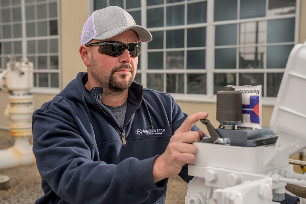 Southern Star worker inspecting a pipeline